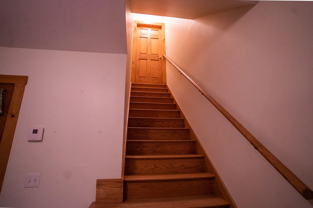 858 Cardville Road Greenbush, ME 04418 - Photo 22 of 36 Stairs to Finished room above garage