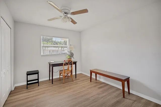 a view of a livingroom with furniture and wooden floor