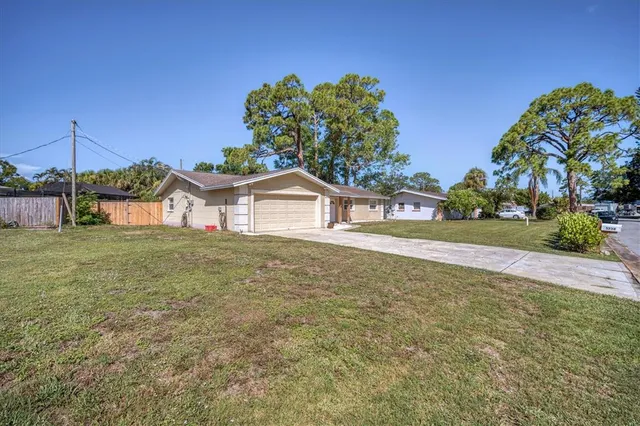 a house view with garden space
