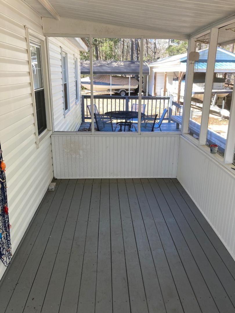 515 Mill Creek Road Vance, SC 29163 - Photo 6 of 16 Screened Porch