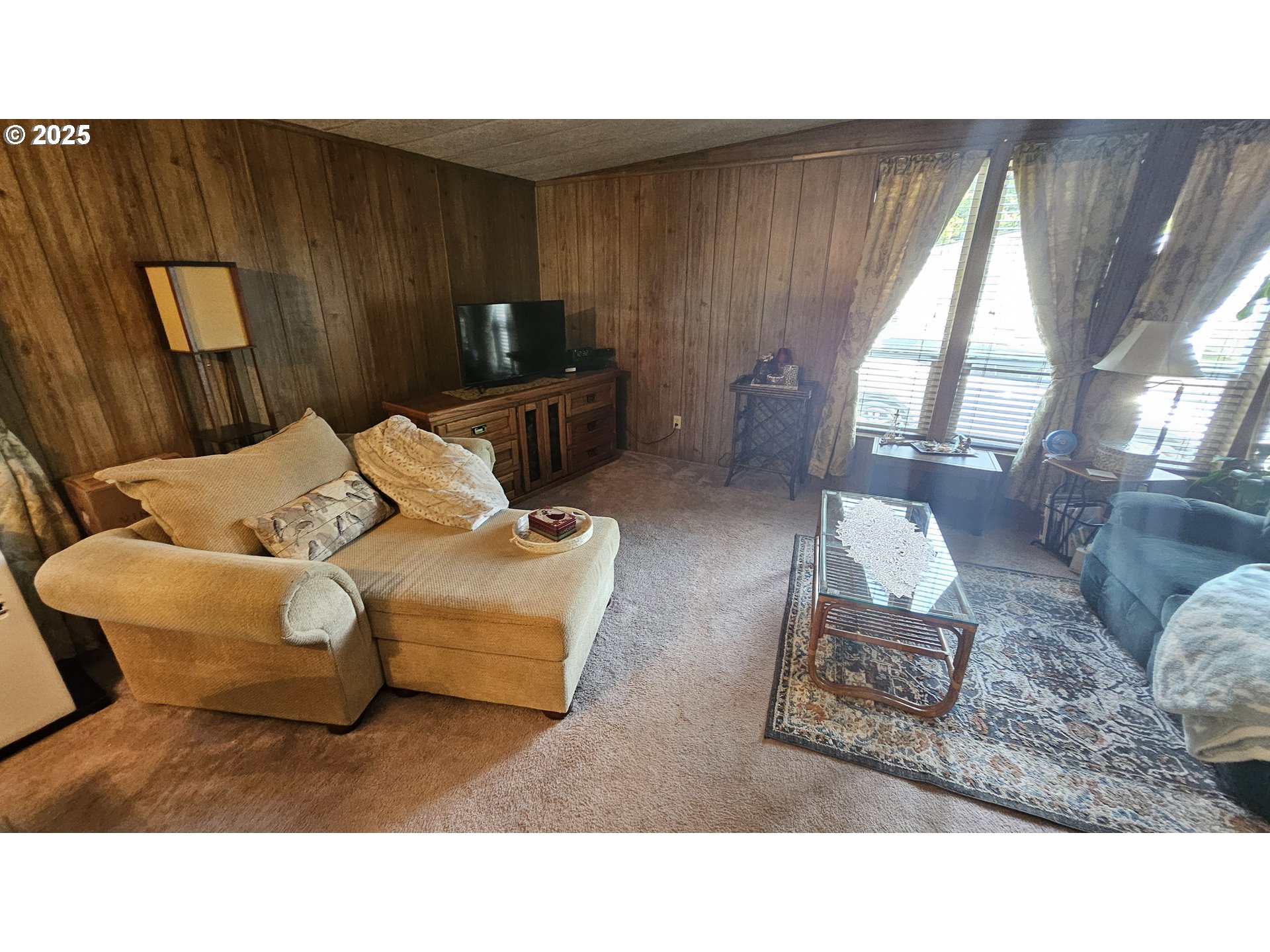 5600 Mt Solo Road Longview, WA 98632 - Photo 14 of 17 a living room with furniture and a large window