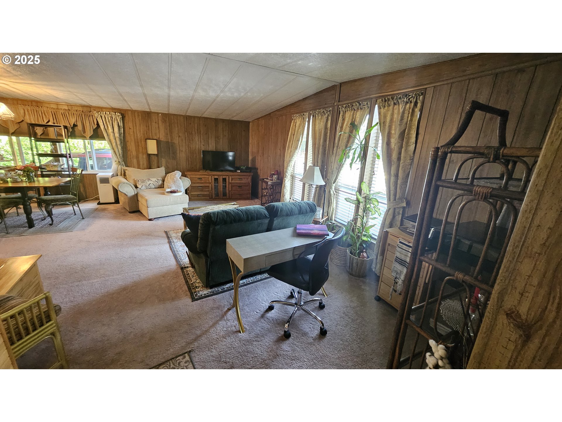5600 Mt Solo Road Longview, WA 98632 - Photo 16 of 17 a living room with furniture and a large window