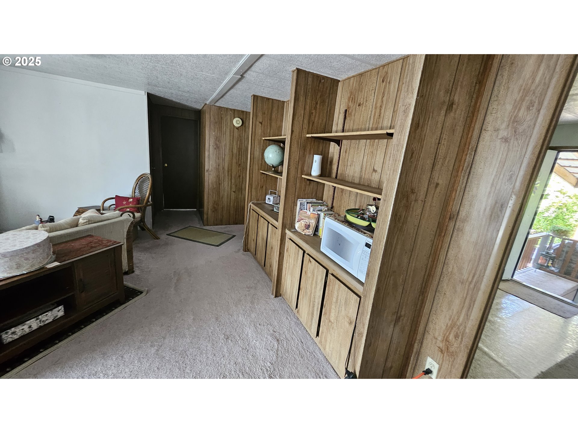 5600 Mt Solo Road Longview, WA 98632 - Photo 3 of 17 a kitchen with stainless steel appliances kitchen island wooden cabinets and a sink