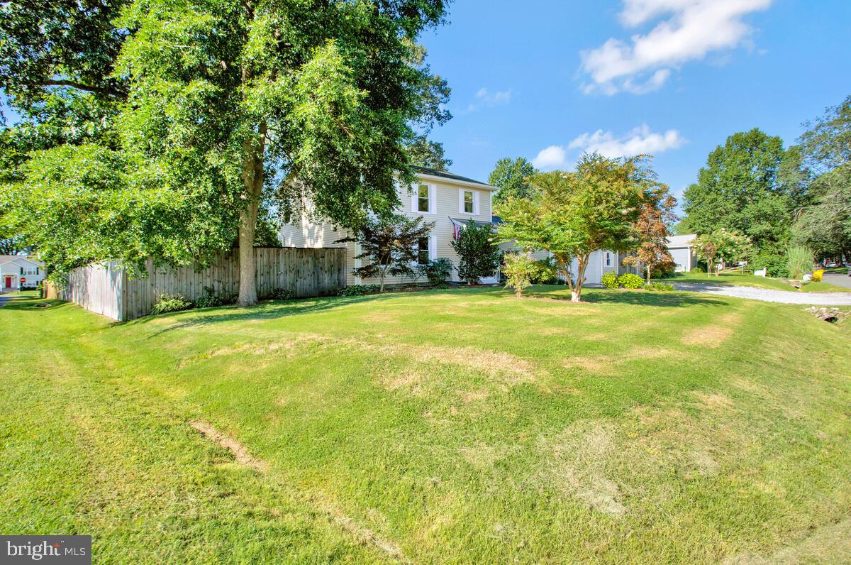 645 Gull Drive Deale, MD 20751 - Photo 12 of 41 a view of a house with a yard and basketball court