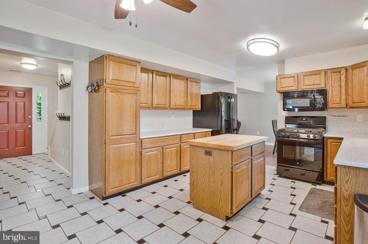 645 Gull Drive Deale, MD 20751 - Photo 14 of 41 a kitchen with appliances cabinets and furniture