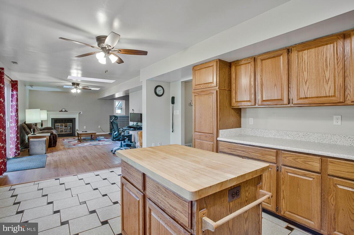 645 Gull Drive Deale, MD 20751 - Photo 41 of 41 a kitchen with a cabinets a sink appliances and a counter top space