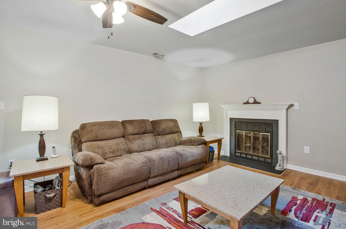 645 Gull Drive Deale, MD 20751 - Photo 17 of 41 a living room with furniture and a fireplace