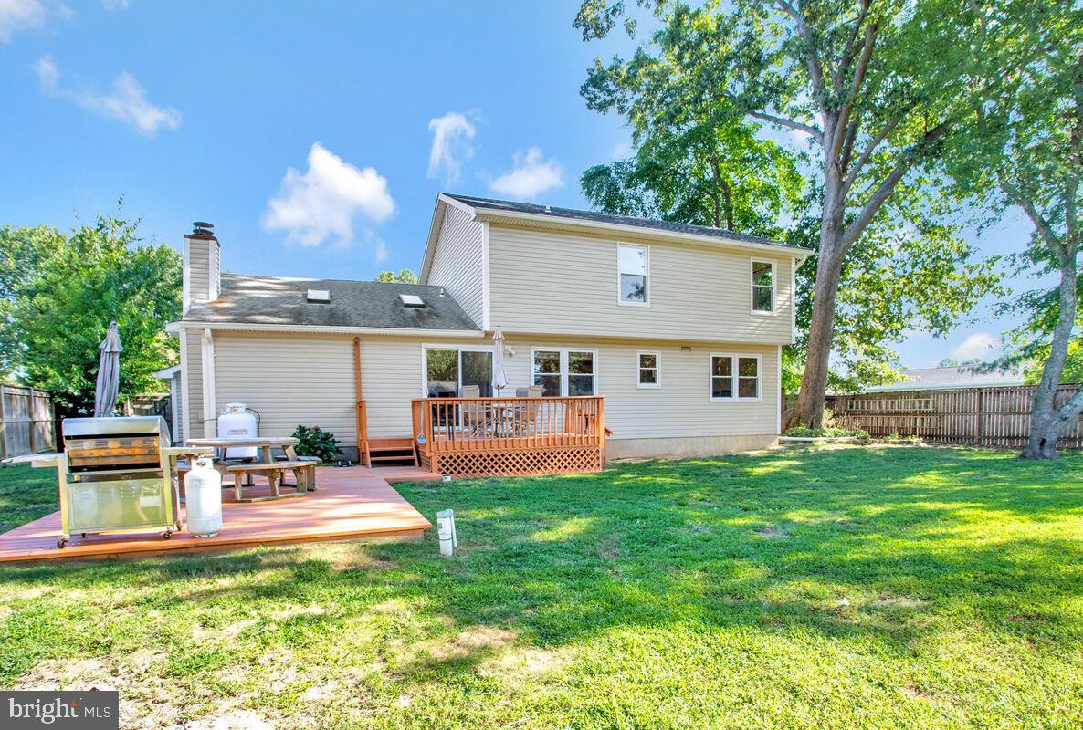 645 Gull Drive Deale, MD 20751 - Photo 3 of 41 a view of a house with a yard and sitting area