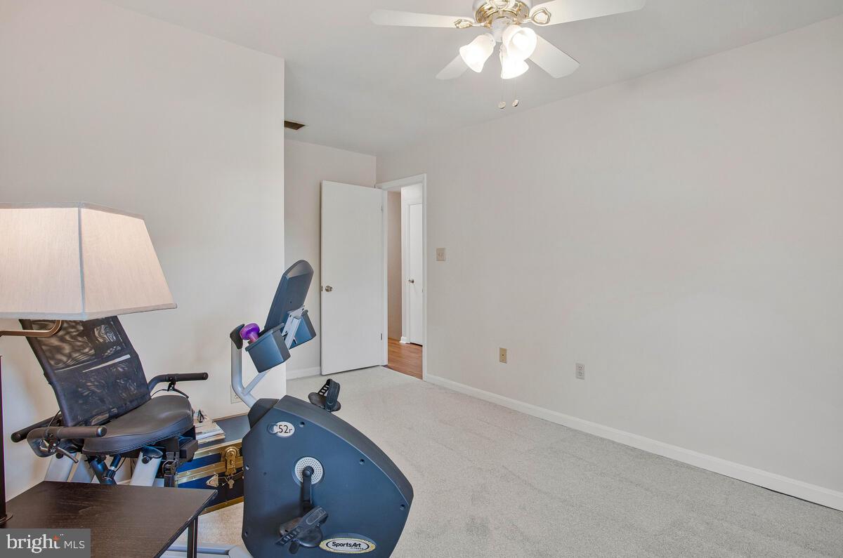 645 Gull Drive Deale, MD 20751 - Photo 30 of 41 a workspace with furniture and mirror