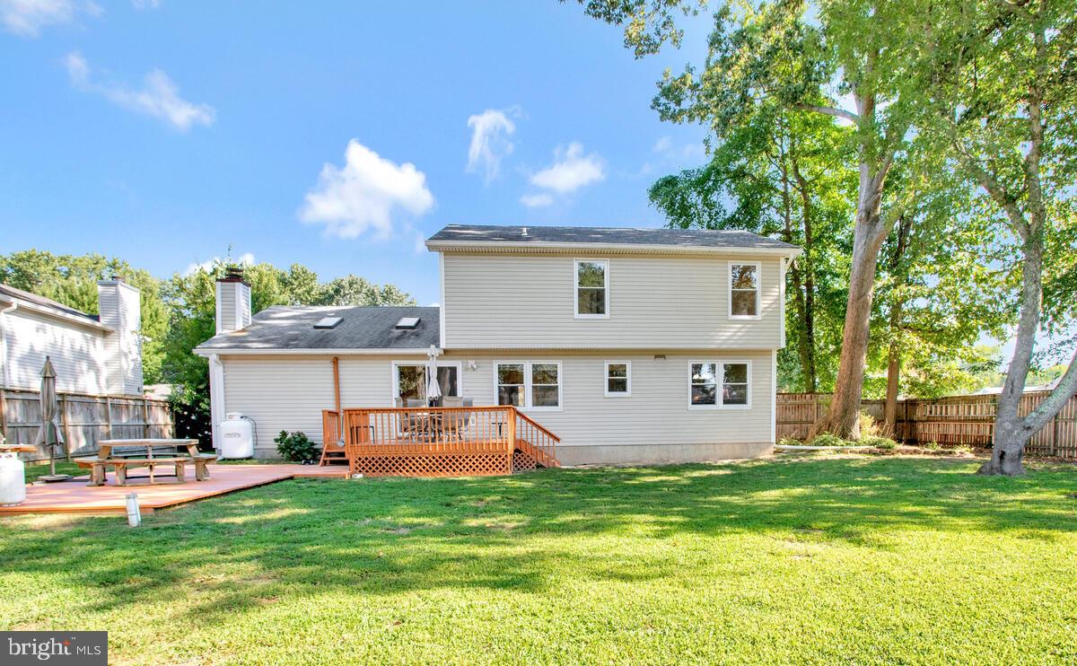 645 Gull Drive Deale, MD 20751 - Photo 35 of 41 a view of a house with a backyard