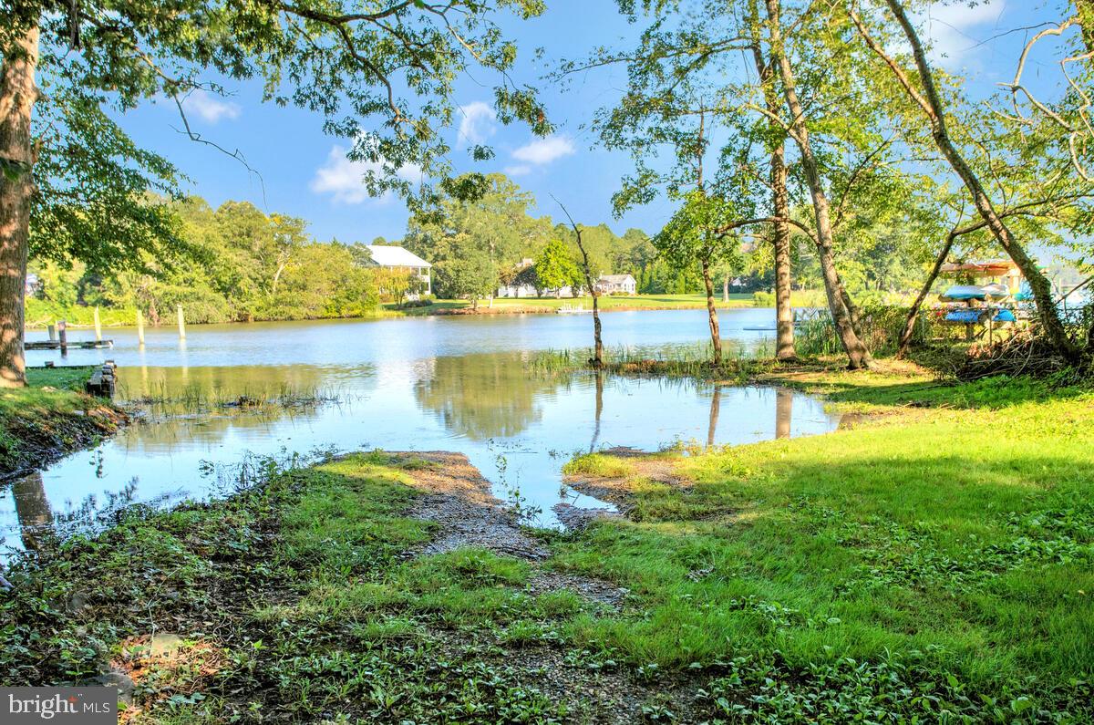 645 Gull Drive Deale, MD 20751 - Photo 4 of 41 a view of a lake with houses