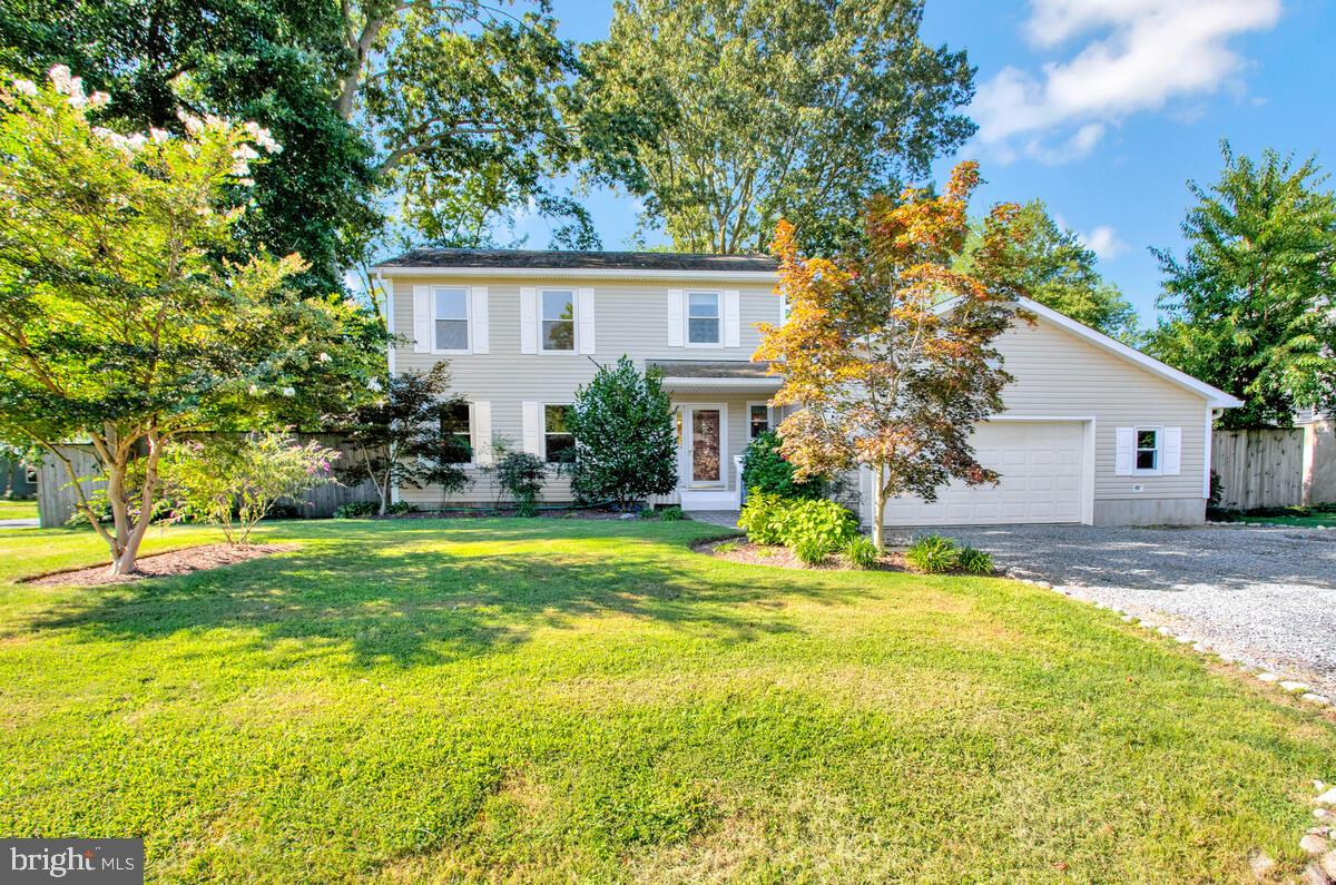 645 Gull Drive Deale, MD 20751 - Photo 5 of 41 a view of a house with swimming pool and a yard