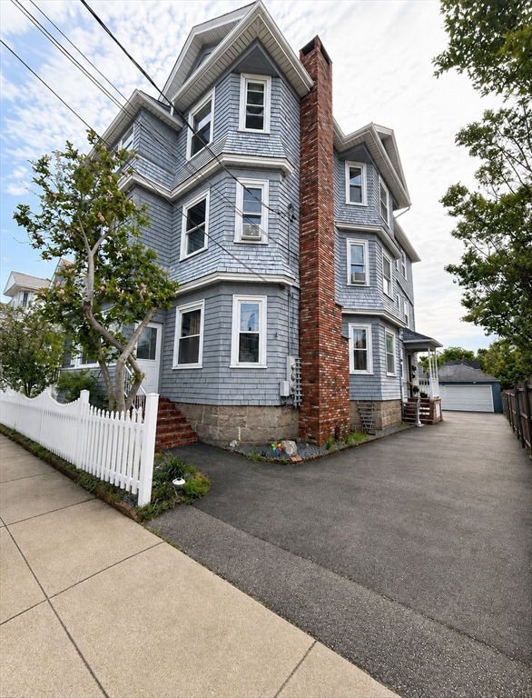 37 Shawmut Street Fall River, MA 02720 - Photo 16 of 16 a front view of a house with a yard