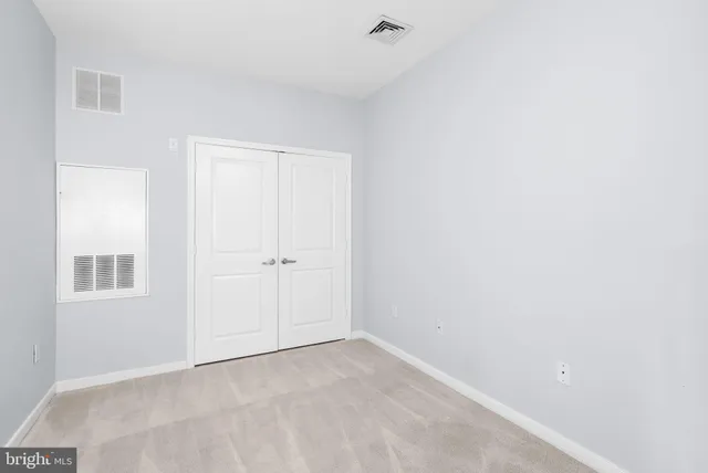 a view of small space with racks on the wall