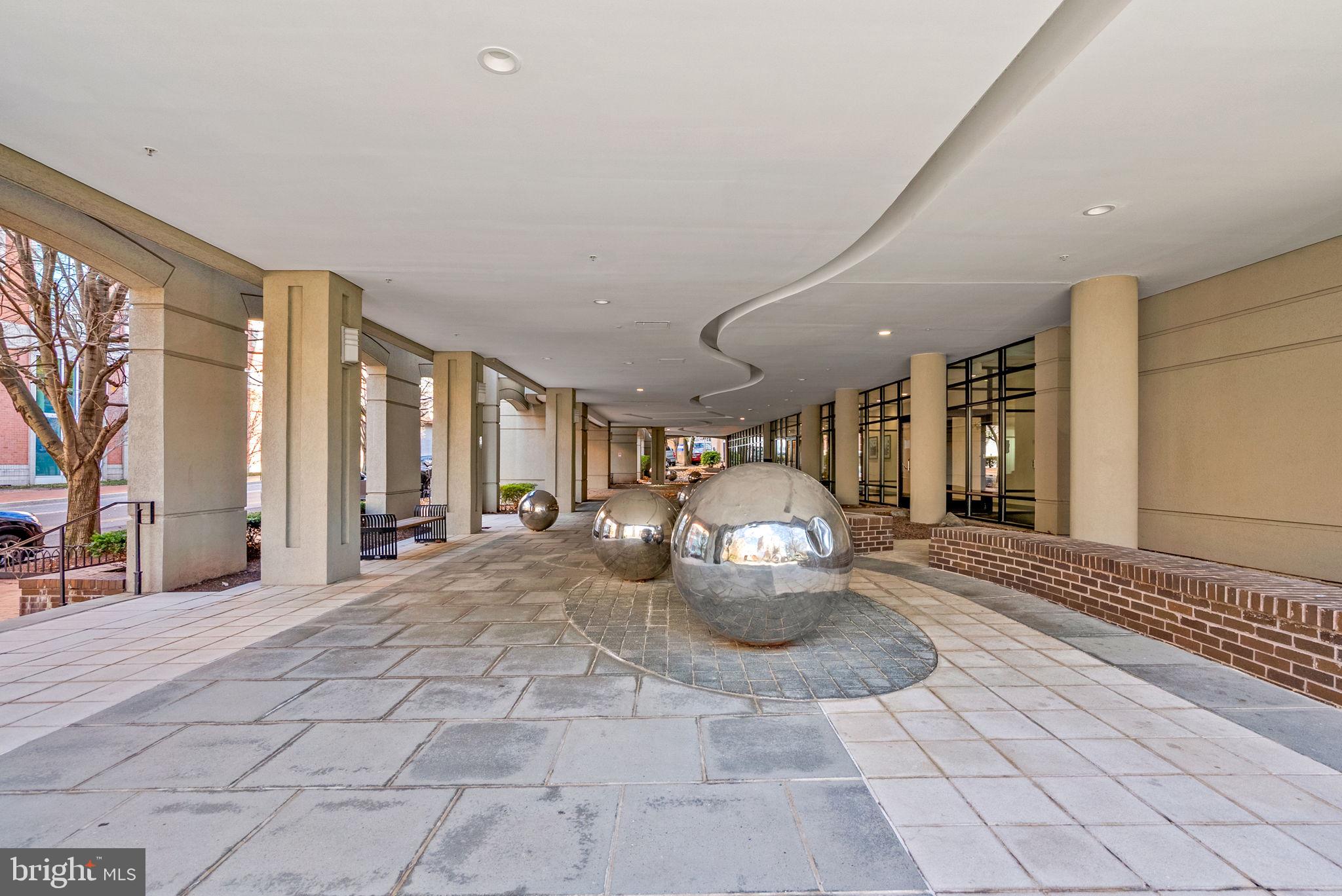 8045 Newell Street, Unit 116 Silver Spring, MD 20910 - Photo 23 of 28 a view of a outdoor space with porch area