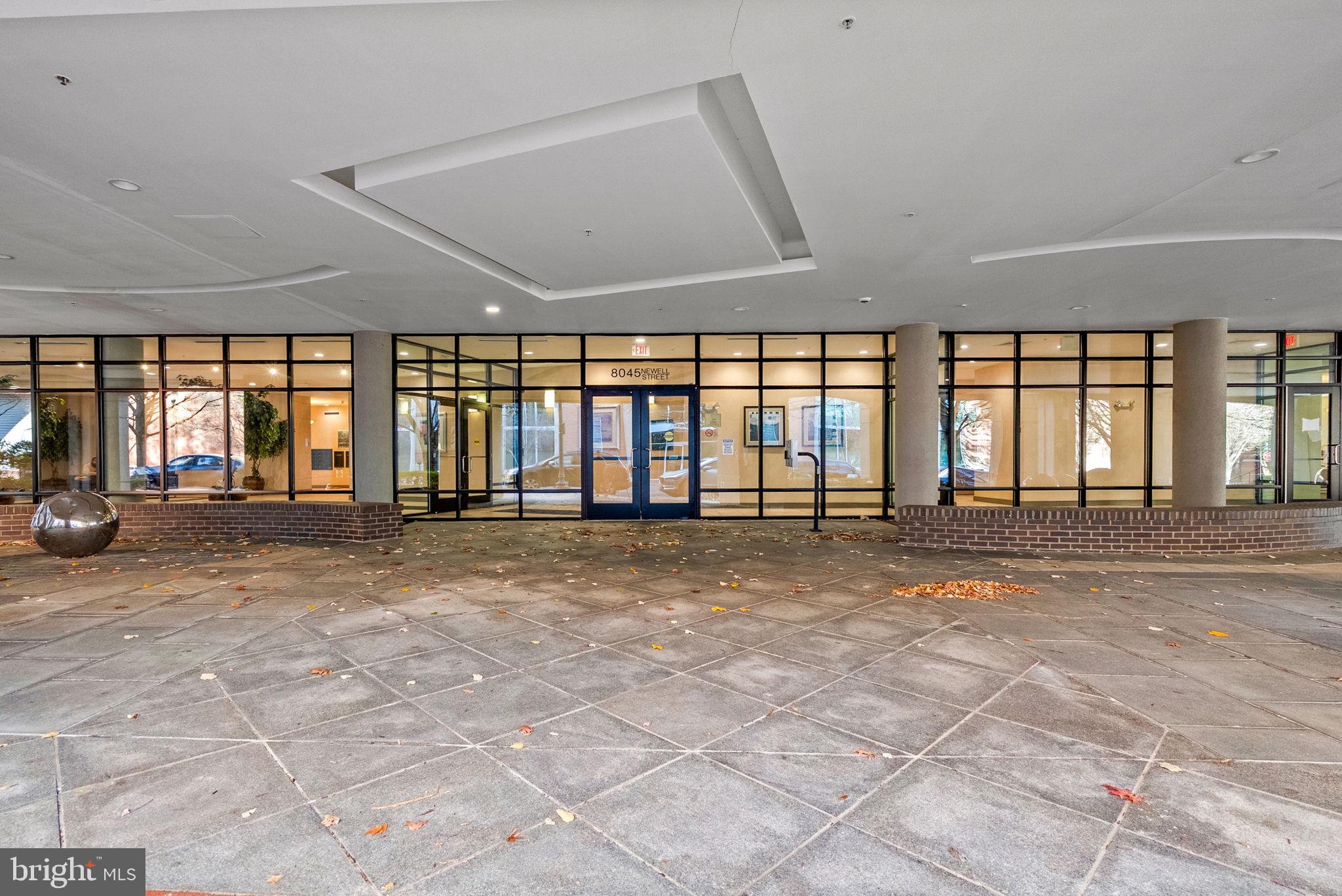 8045 Newell Street, Unit 116 Silver Spring, MD 20910 - Photo 24 of 28 a view of an empty room with a window