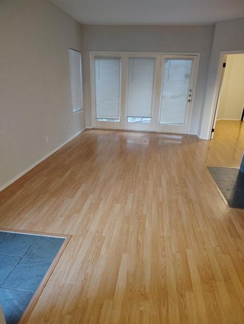 5550 Spring Valley Road, Unit D16 Dallas, TX 75254 - Photo 3 of 6 a view of a room with wooden floor