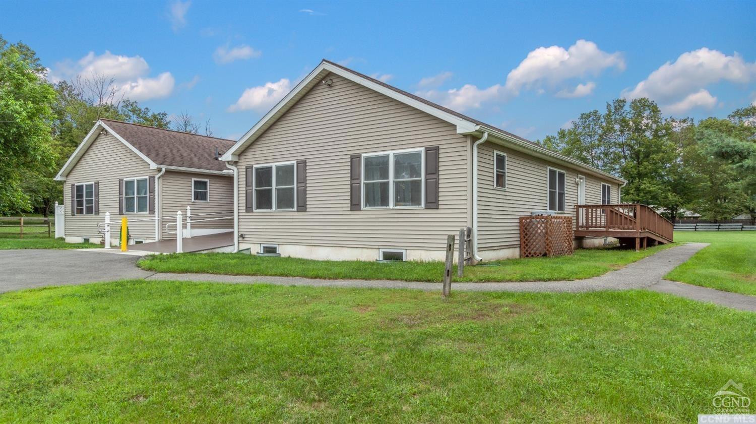 3 Cross Street Copake, NY 12516 - Photo 5 of 5 a view of a house with a backyard