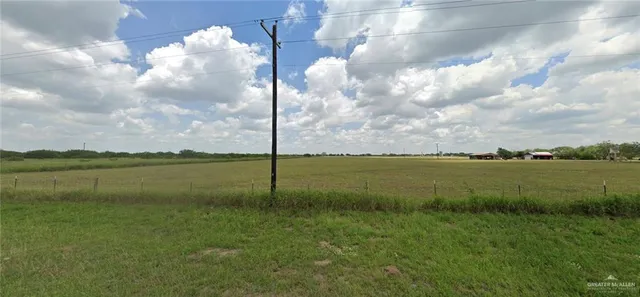 a view of a lake and a yard