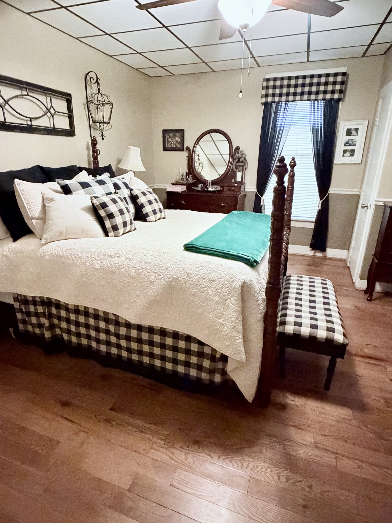 404 South Church Street Adams, TN 37010 - Photo 11 of 18 a bedroom with bed and wooden floor