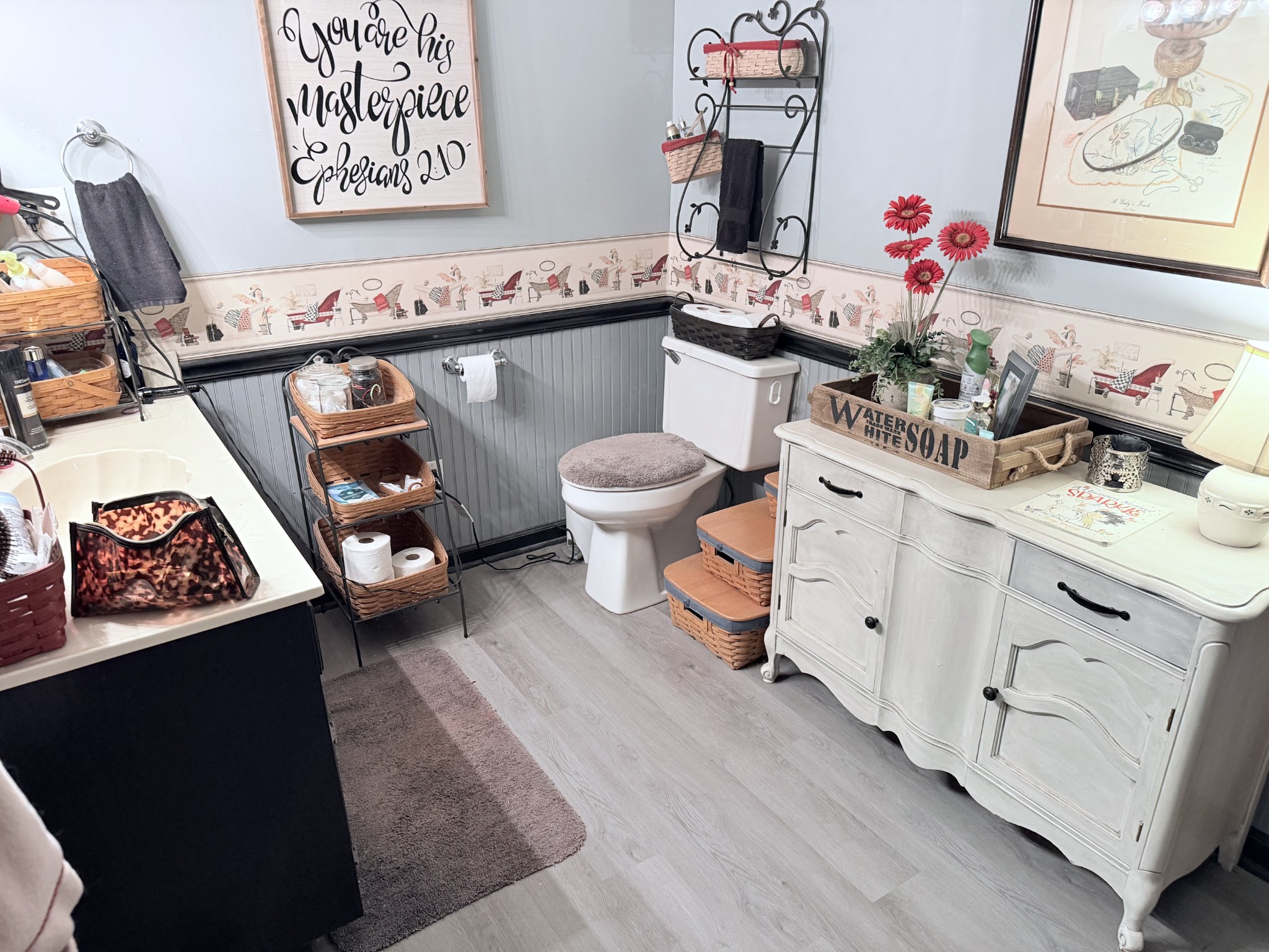 404 South Church Street Adams, TN 37010 - Photo 16 of 18 a bathroom with a sink mirror and toilet