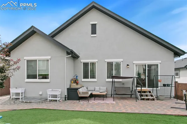 a front view of a house with patio