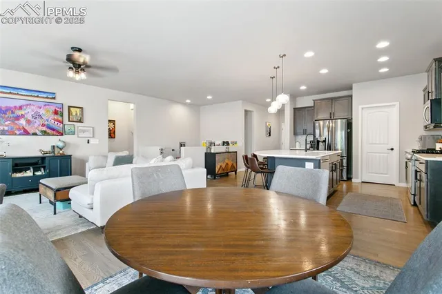 a view of a dining room kitchen with furniture and a kitchen view