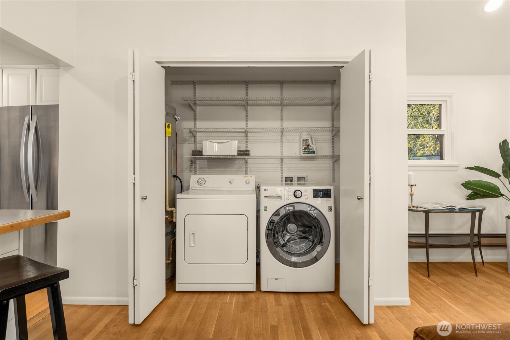 5143 46th Avenue Northeast Seattle, WA 98105 - Photo 15 of 33 a view of a hallway with washer and dryer