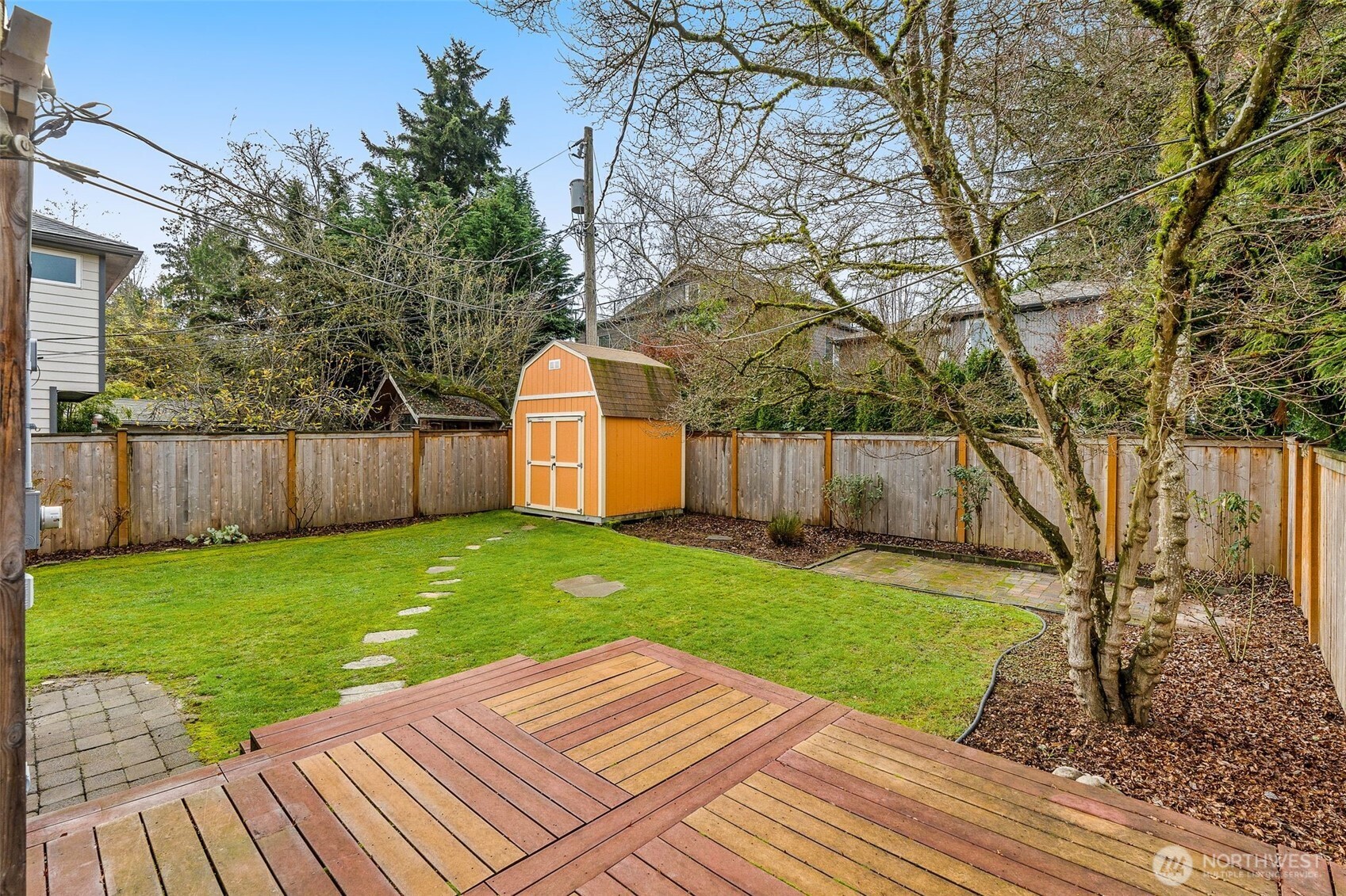 5143 46th Avenue Northeast Seattle, WA 98105 - Photo 22 of 33 a view of a backyard with wooden floor
