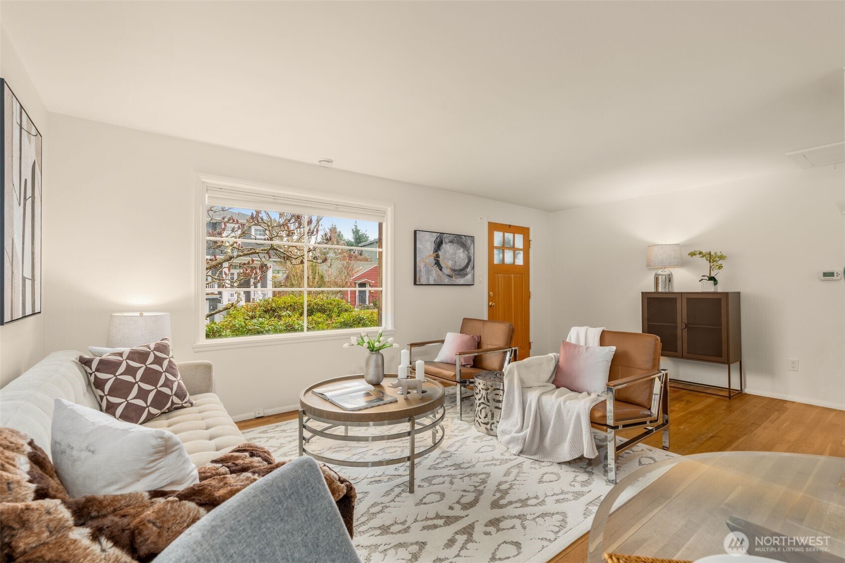 5143 46th Avenue Northeast Seattle, WA 98105 - Photo 8 of 33 a living room with furniture and a table