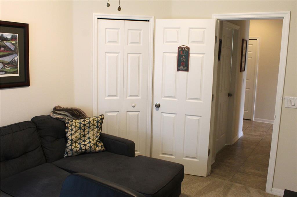 4110 Arlington Ridge Boulevard Leesburg, FL 34748 - Photo 16 of 33 a living room with furniture and a gate