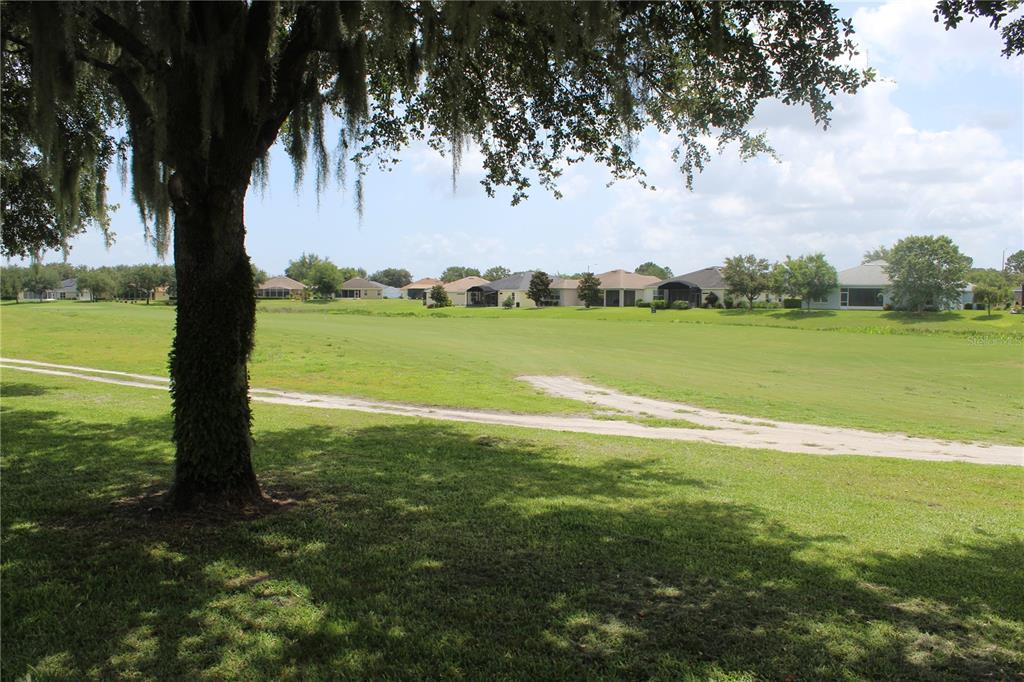 4110 Arlington Ridge Boulevard Leesburg, FL 34748 - Photo 22 of 33 a view of a field with an ocean