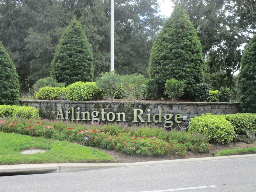 4110 Arlington Ridge Boulevard Leesburg, FL 34748 - Photo 25 of 33 a view of sign board with flower around
