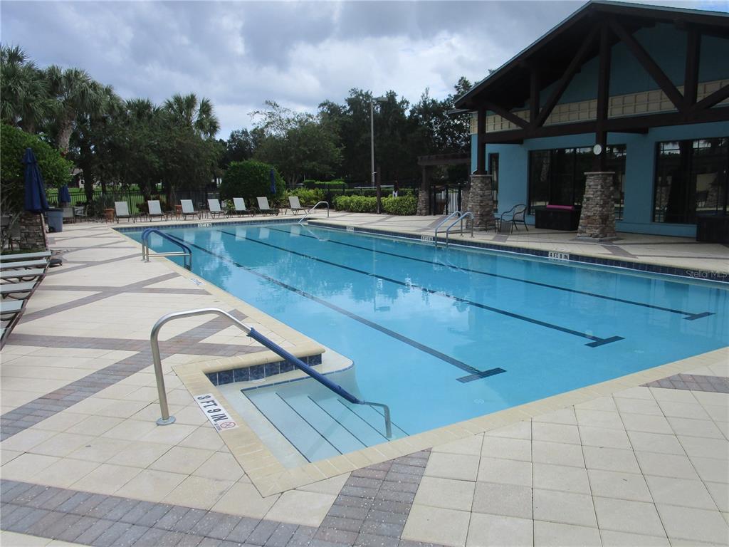 4110 Arlington Ridge Boulevard Leesburg, FL 34748 - Photo 30 of 33 a view of swimming pool with outdoor seating