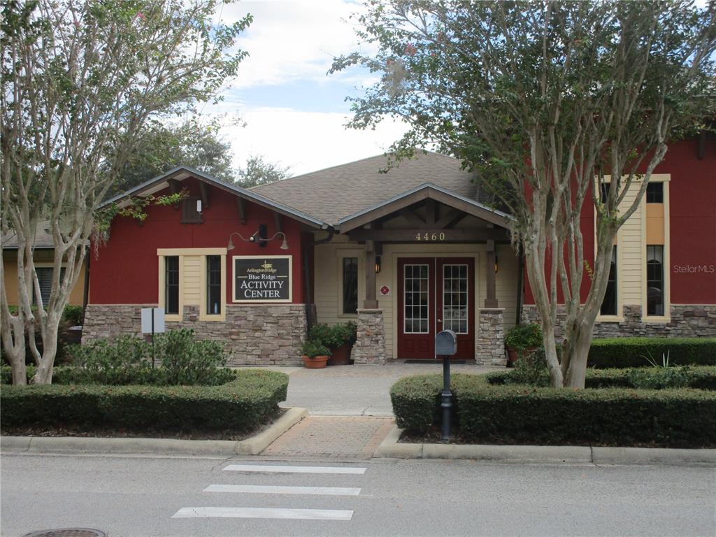 4110 Arlington Ridge Boulevard Leesburg, FL 34748 - Photo 33 of 33 a front view of a house with a garden