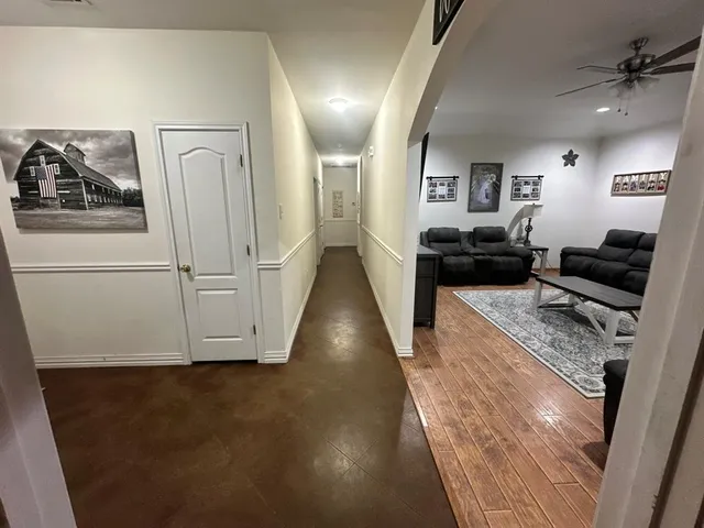 a living room with furniture and a couch