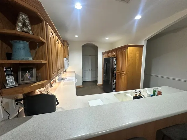 a view of living room with furniture and a flat screen tv