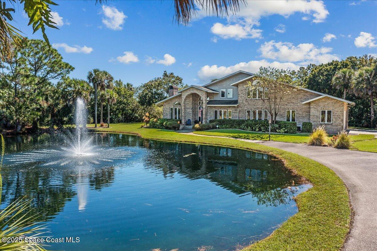 3651 Big Pine Road Melbourne, FL 32934 - Photo 29 of 32 a swimming pool view with a outdoor seating