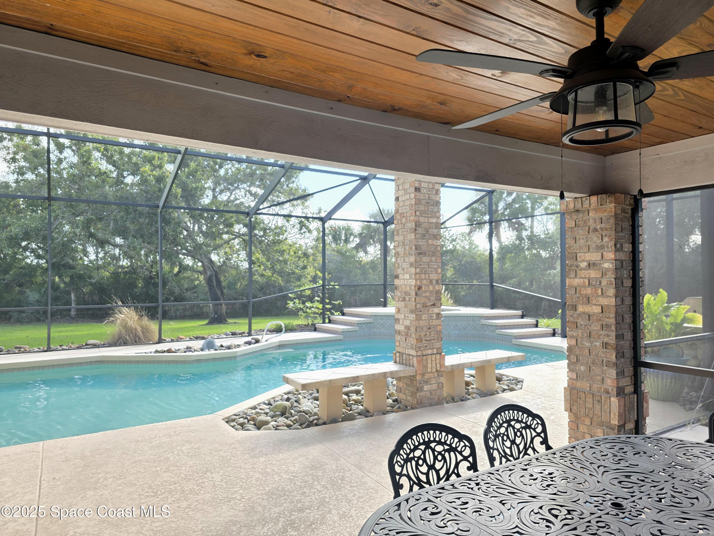 3651 Big Pine Road Melbourne, FL 32934 - Photo 3 of 32 a view of a porch with furniture and garden