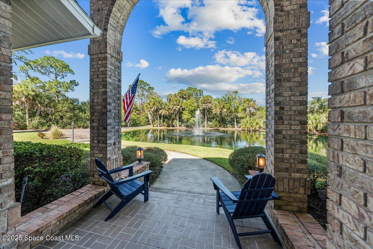 3651 Big Pine Road Melbourne, FL 32934 - Photo 10 of 32 a bench sitting in front of a building