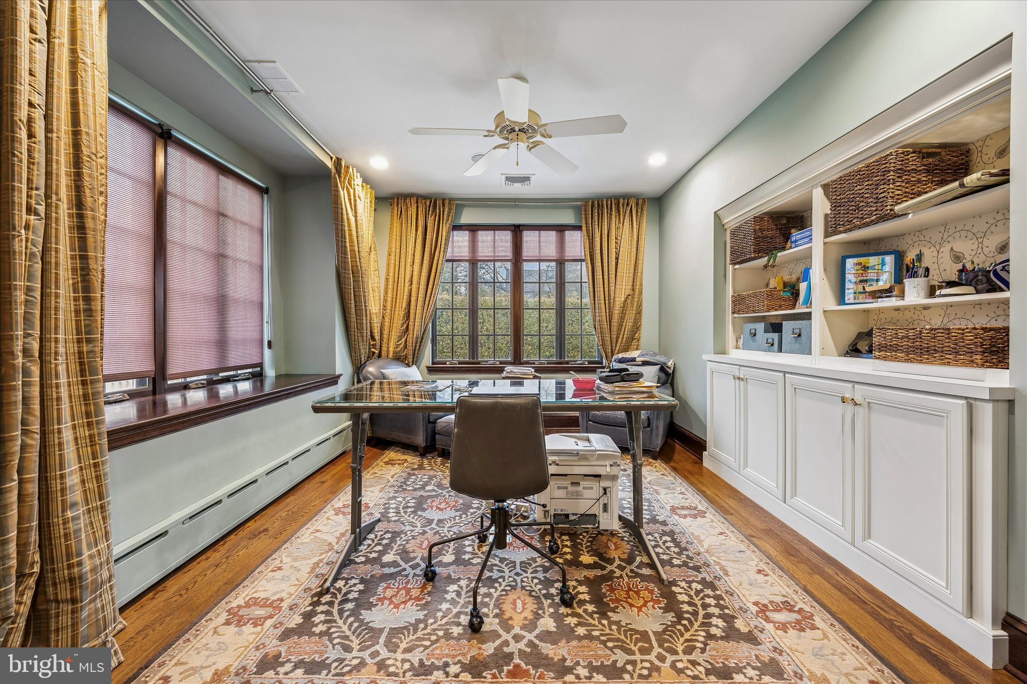 239 Winding Way Merion Station, PA 19066 - Photo 16 of 48 a living room with furniture and a floor to ceiling window