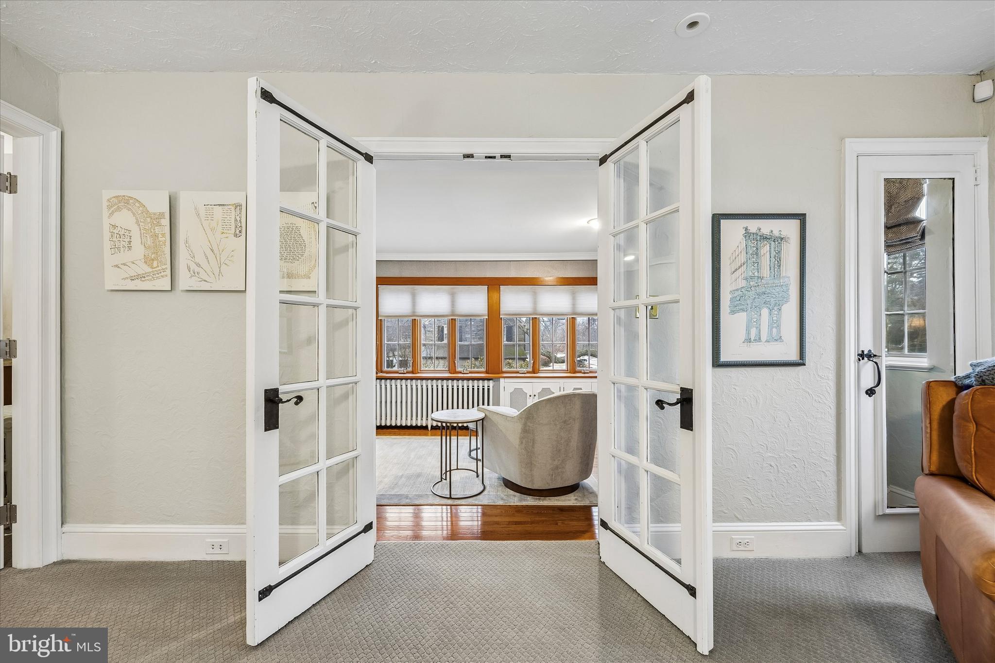 239 Winding Way Merion Station, PA 19066 - Photo 22 of 48 a view of a livingroom with furniture and windows
