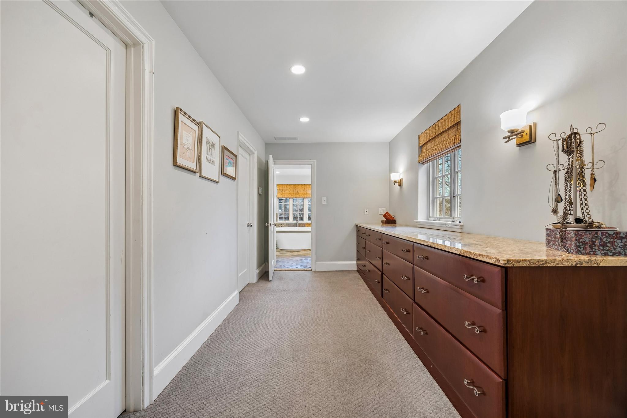 239 Winding Way Merion Station, PA 19066 - Photo 25 of 48 a bathroom with a double vanity sink and a mirror