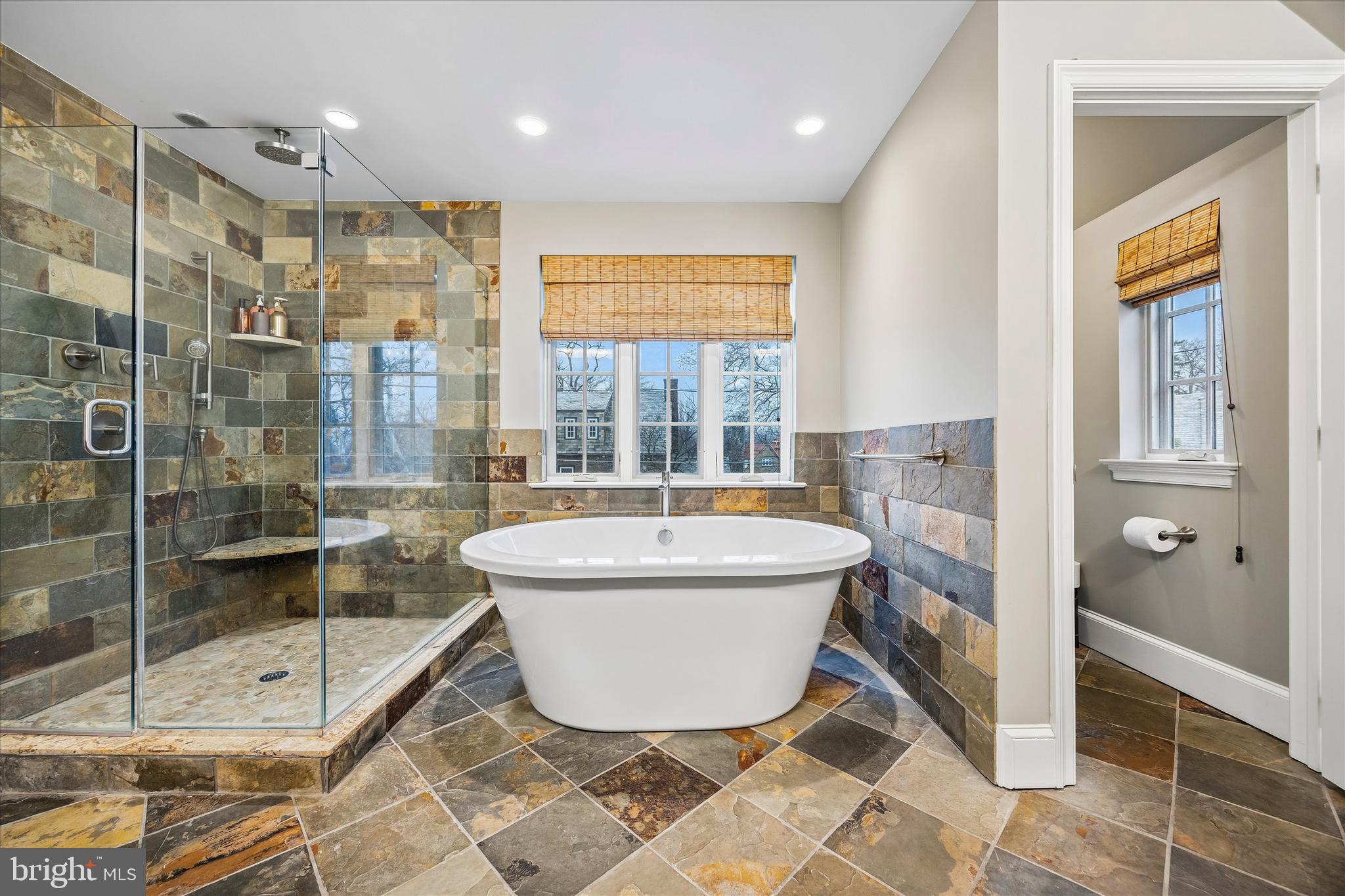 239 Winding Way Merion Station, PA 19066 - Photo 27 of 48 a spacious bathroom with a bathtub and shower