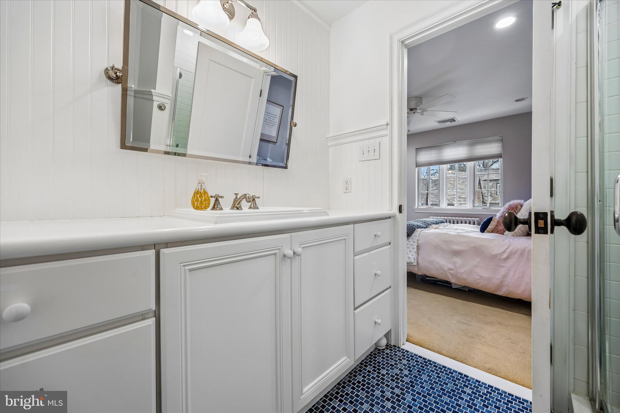 239 Winding Way Merion Station, PA 19066 - Photo 33 of 48 a en suite bathroom with a sink and a mirror