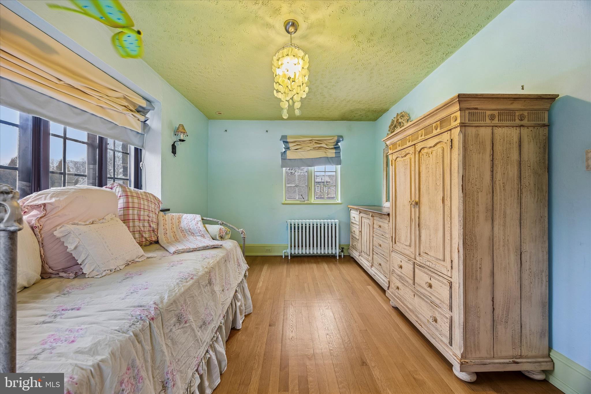 239 Winding Way Merion Station, PA 19066 - Photo 35 of 48 a bedroom with a bed and a window