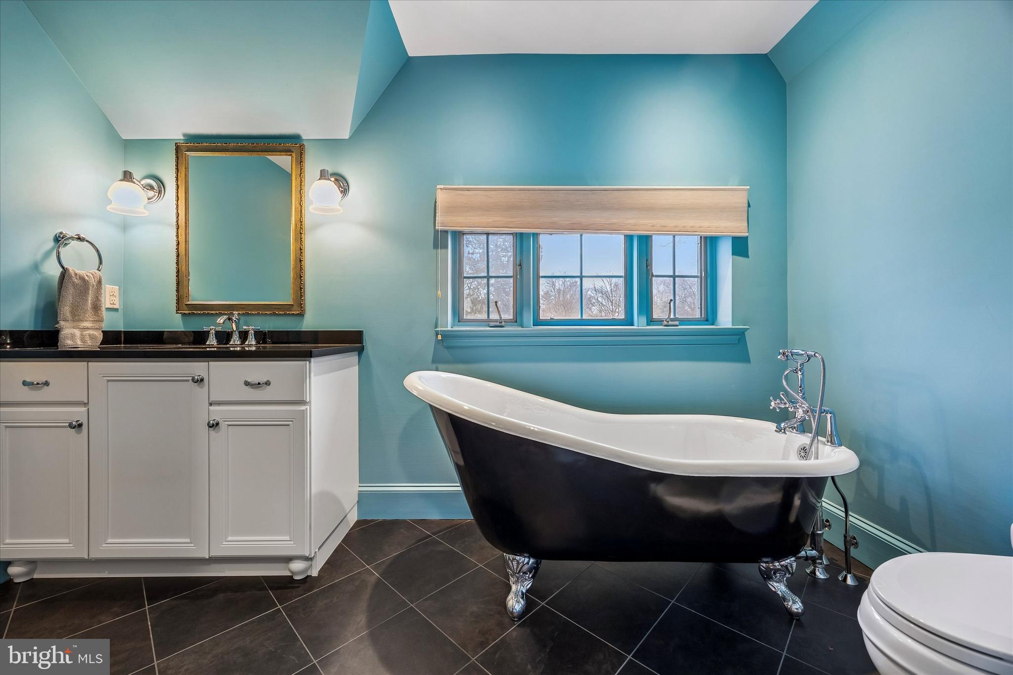 239 Winding Way Merion Station, PA 19066 - Photo 37 of 48 a bathroom with a sink and a mirror