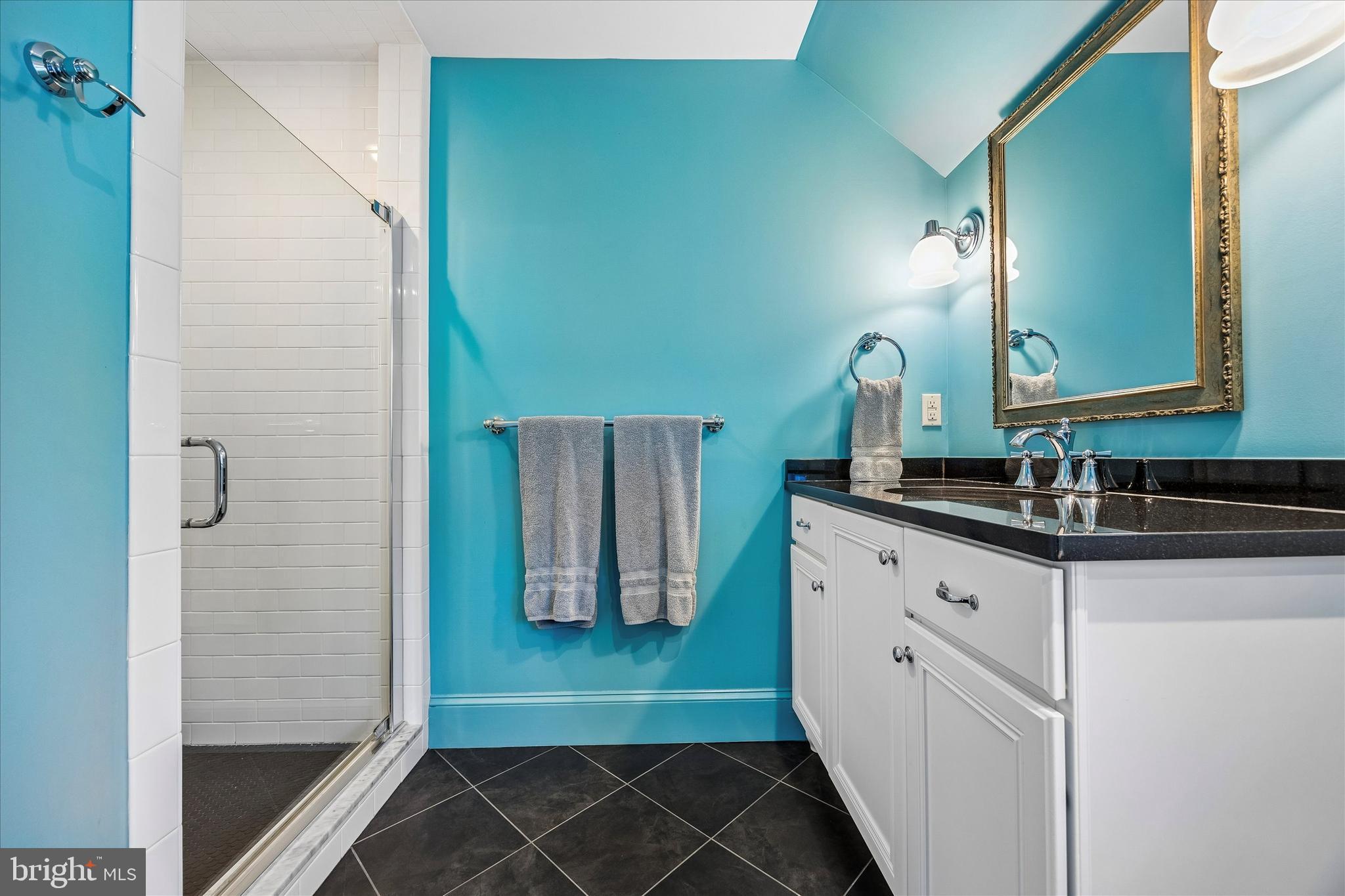 239 Winding Way Merion Station, PA 19066 - Photo 38 of 48 a bathroom with a sink and a mirror