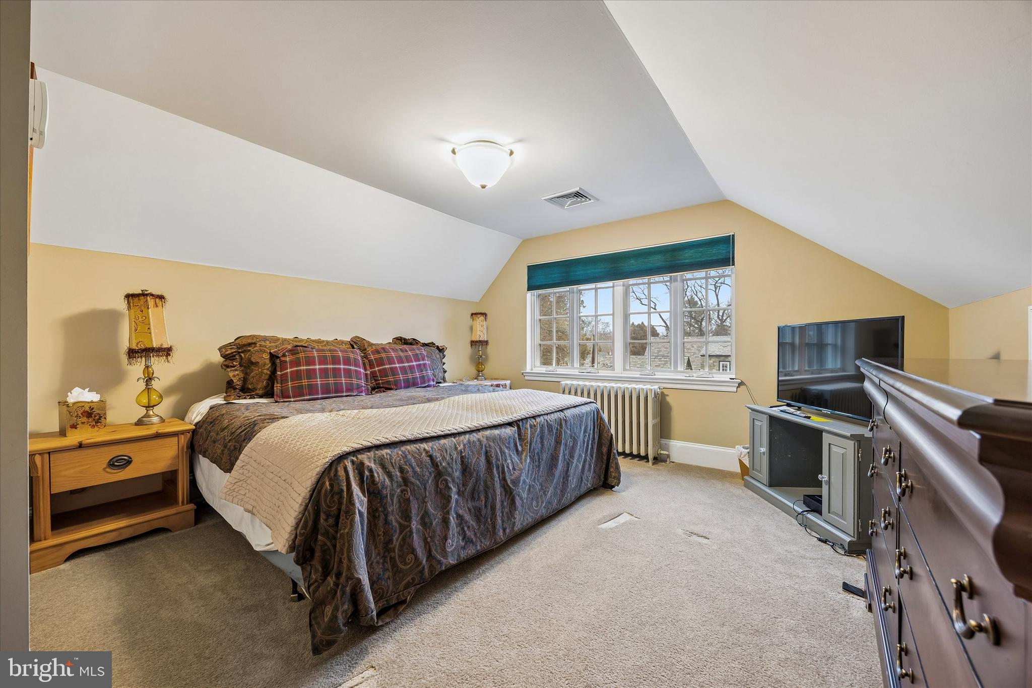 239 Winding Way Merion Station, PA 19066 - Photo 39 of 48 a spacious bedroom with a large bed and a large window