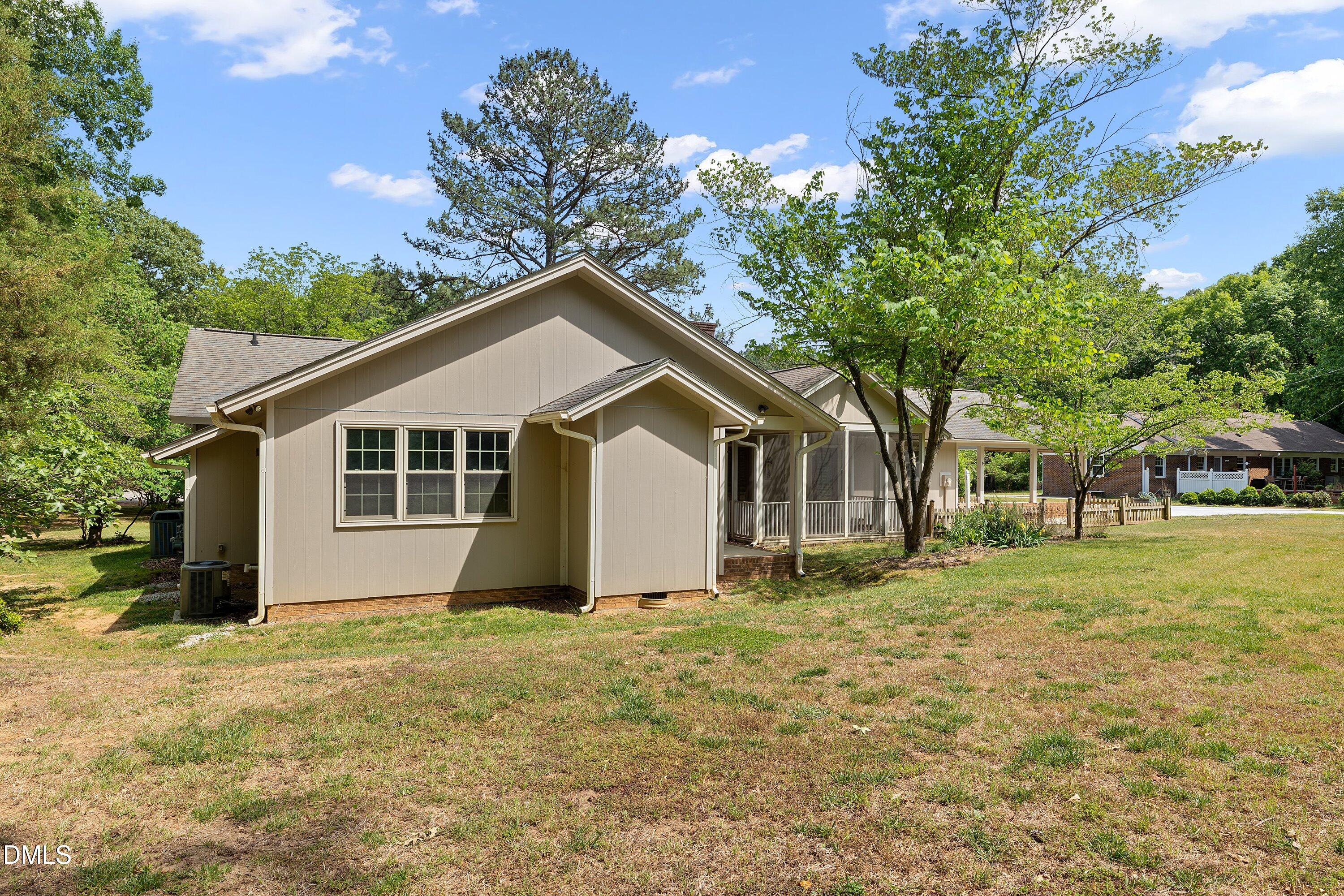 8133 Holly Forest Road Wake Forest, NC 27587 - Photo 46 of 50 a view of a house with a yard
